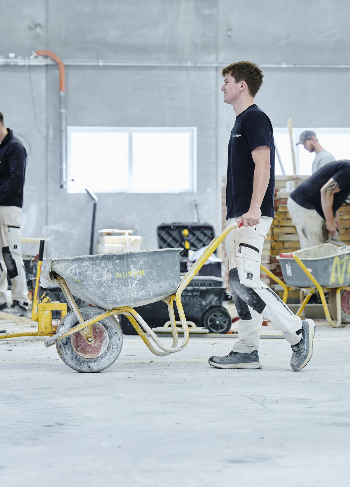 Elever i murerhallen